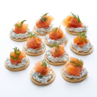 10 Smoked Salmon on Mini Blinis with Cucumber, Tzatziki Yogurt Sauce